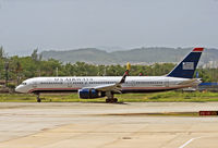 N200UU @ TJSJ - A US Airways Boeing 757, thrust reversers and spoilers deployed, comes to a stop on the southern runway at San Juan. - by Daniel L. Berek