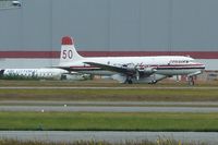 C-GKUG @ CYXX - 1957 Douglas DC-6B, c/n: 45177 at Abbotsford - by Terry Fletcher