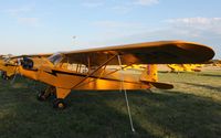 N77639 @ KOSH - Piper  J3C-65 - by Mark Pasqualino