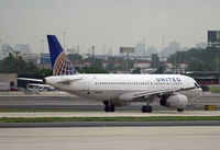 N462UA @ KEWR - A newly repainted United Airlines Airbus A320 taxies out at Newark. - by Daniel L. Berek
