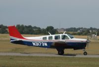 N3173W @ KAXN - Beech A36 Bonanza taxiing to runway 22. - by Kreg Anderson
