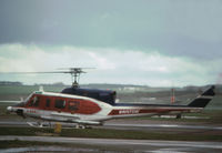 G-BARJ @ INV - Bell 212 of Bristows Helicopters seen at Inverness Airport at Dalcross in May 1979. - by Peter Nicholson
