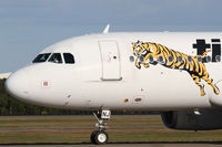 VH-VNJ @ YBBN - Tiger Airways Airbus A320 - by Thomas Ranner
