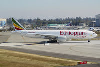 ET-APS @ KPAE - Seen taking runway 16R is the first Ethiopian Cargo 777F. - by Joe G. Walker