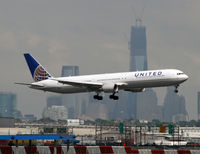 N68061 @ KEWR - With the Liberty Tower in the background, a United Airlines Boeing 767-424/ER comes in for a landing at Newark's short cross-runway. - by Daniel L. Berek