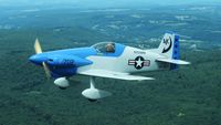 N702MM - Midget Mustang flown by builder John Errington flying formation with C-182 piloted by Fred Marsh and flying just a few miles south of Corning, NY. - by Jack Childs