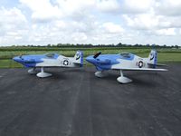 N701MM @ I95 - Twin Midget Mustangs (N701MM & N702MM) on the ground at the Harden County Airport. This is the first time the twins flew together. - by John Errington