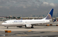 N12238 @ KEWR - A United Boeing 737-824 taxies in at Newark International. - by Daniel L. Berek