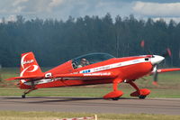 SP-AUP @ ESKD - Extra EA-330LC of the Zelazny Aerobatic Team landing at Dala-Järna airfield, Sweden - by Henk van Capelle