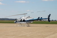 N73AW @ KCGI - Had to crawl behind bushes and shoot through the fence for this one! - by Glenn E. Chatfield