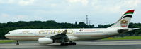 A6-AFD @ EDDL - Etihad (2012 Abu Dhabi F1 Grand Prix Sticker), seen here on RWY23L at Düsseldorf Int´l (EDDL) - by A. Gendorf