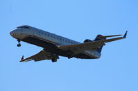 N406AW @ KBDL - Air Wisconsin flight 3784 from Reagan National on final for runway 6. - by Mark K.