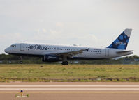 N564JB @ AUA - Landing on Aruba Airport - by Willem Göebel