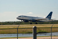 N523JB @ RSW - Landing from Newark - by Mauricio Morro
