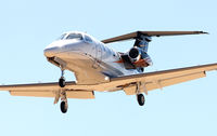 N74GH @ KHIO - 2011 Embraer Phenom 100.  Landing Rwy 31 KHIO.  8-30-12 - by Gary Rogers