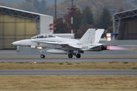 162885 @ KBFI - All white F/A-18 blasts off from BFI on a typical fall evening. Aircraft was formerly with the US Navy's Fighter Pilot School. - by Joe G. Walker