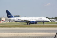N536JB @ KSRQ - JetBlue Flight 164 (N536JB) prepares for flight at Sarasota-Bradenton International Airport - by jwdonten