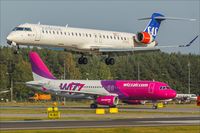 OY-KFG @ EPGD - Canadair CL-600-2B24 - by Jerzy Maciaszek