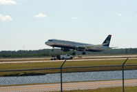 N559UW @ RSW - Landing really close to ground crew working next to RWY 6 - by Mauricio Morro
