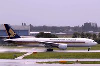 9V-SVF @ EHAM - Boeing 777-212ER [30871] (Singapore Airlines) Amsterdam-Schiphol~PH 10/08/2006 . Seen departing during a rain storm. - by Ray Barber