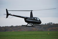 G-OONA @ EGTB - Robinson R44 Clipper II at Wycombe Air Park - by moxy