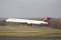 N958DL @ KBDL - Delta flight 1430 from Detroit Metro is just a couple of feet from touching down on runway 24. - by Mark K.
