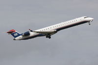 N956LR @ KSRQ - US Air Flight 2678 operated by Mesa (N956LR) departs Sarasota-Bradenton International Airport enroute to Charlotte-Douglas International Airport - by jwdonten