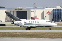 N840FL @ KSRQ - Raytheon Hawker 800 (N840FL) taxis at Sarasota-Bradenton International Airport - by Jim Donten