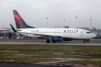 N302DQ @ ATL - Delta Air Lines N302DQ (FLT DAL1265) taxiing to Gate E31 after arrival from Savannah/Hilton Head (KSAV). - by Dean Heald