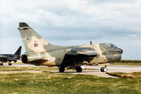 5527 @ EGQS - Portuguese Air Force A-7P Corsair II of 304 Esquadron taxying to Runway 05 at RAF Lossiemouth in September 1993. - by Peter Nicholson