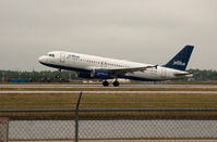 N536JB @ RSW - Touching down RWY 6 - by Mauricio Morro