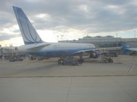 N576UA @ KDCA - United 752 at the gate as viewed from an arriving flight to Reagan National Airport - by Jim Donten
