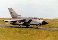 ZA474 @ EGQS - Tornado GR.1B, callsign Jackal 1, of 12 Squadron taxying to Runway 05 at RAF Lossiemouth in the Summer of 1997. - by Peter Nicholson