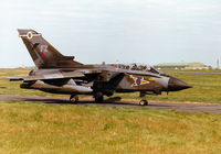 ZA410 @ EGQS - Tornado GR.1, callsign Jackal 2, of 12 Squadron taxying to Runway 05 at RAF Lossiemouth in the Summer of 1997. - by Peter Nicholson