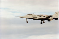 XZ357 @ EGQS - Jaguar GR.1A of 41 Squadron at RAF Coltishall on final approach to Runway 23 at RAF Lossiemouth in the Summer of 1993. - by Peter Nicholson