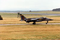 XX748 @ EGQS - Jaguar GR.1A of 54 Squadron at RAF Coltishall awaiting clearance to join the active runway at RAF Lossiemouth in the Summer of 1993. - by Peter Nicholson