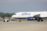 N583JB @ KSRQ - JetBlue Flight 346 Bluesville (N583JB) prepares for flight at Sarasota-Bradenton International Airport - by Jim Donten