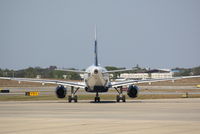 N634JB @ KSRQ - JetBlue Flight 346 B*L*U*E (N634JB) prepares for flight at Sarasota-Bradenton International Airport - by Jim Donten