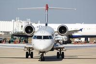 N933LR @ KSRQ - US Air Flight 2678 operated by Mesa (N933LR) prepares for flight at Sarasota-Bradenton International Airport - by Jim Donten