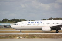 N24224 @ KSRQ - United Flight 1190 (N24224) arrives at Sarasota-Bradenton International Airport following a flight from Chicago-O'Hare International Airport - by Jim Donten