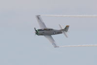 N661NA @ KMCF - A T-28 Trojan (N661NA) performs at MacDill Air Fest - by Jim Donten