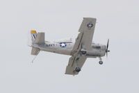 N661NA @ KMCF - A T-28 Trojan (N661NA) performs at MacDill Air Fest - by Jim Donten