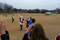 N73AM - Santa and Mrs. Santa arrive in N73AM, 12-08-2012 - by Karl Martin