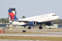 N316US @ KSRQ - Delta Flight 1146 (N316US) departs Runway 14 at Sarasota-Bradenton International Airport enroute to Detroit Metropolitan Wayne County Airport - by Jim Donten