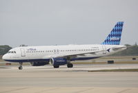 N506JB @ KSRQ - JetBlue Flight 1187 Wild Blue Yonder (N506JB) arrives at Sarasota-Bradenton International Airport following a flight from Boston-Logan International Airport - by Jim Donten