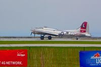 N3193G @ BKL - Landing after its fly-overs at the 2012 Cleveland National Air Show - by Murat Tanyel
