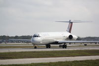N962DL @ KSRQ - Delta Flight 2298 (N962DL) taxis for flight at Sarasota-Bradenton International Airport - by Jim Donten