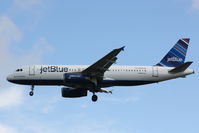 N594JB @ KSRQ - JetBlue Flight 341 Whole Lotta Blue (N594JB) arrives at Sarasota-Bradenton International Airport following a flight from John F Kennedy International Airport - by Jim Donten