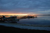 N31357 - Sunset on Lake Dora, Mt. Dora Florida, Lakeside Inn dock. - by Richard Ciavarra