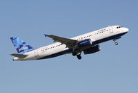 N605JB @ KSRQ - Jet Blue Airbus A320 (N706JB) departs Runway 14 at Sarasota-Bradenton International Airport - by Jim Donten